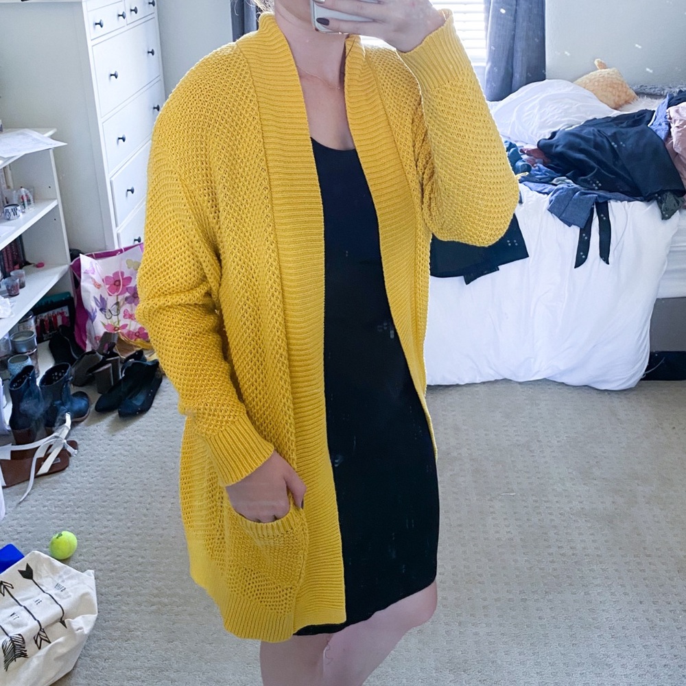 Yellow cable-knit sweater